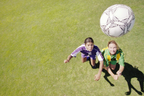 Soccer Players Watching Ball in Air Image by © Royalty-Free/Corbis